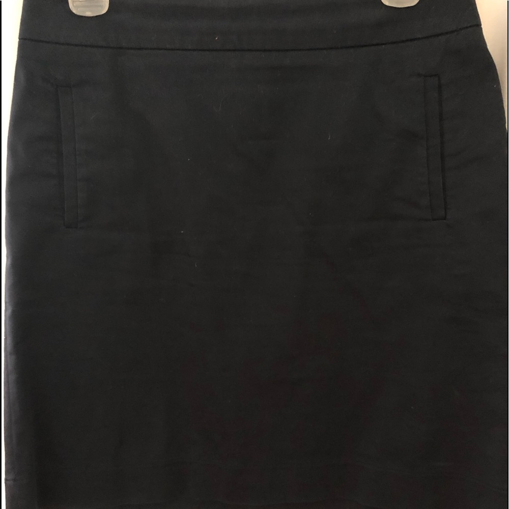 Small front slit pockets, lined cotton, 19” long